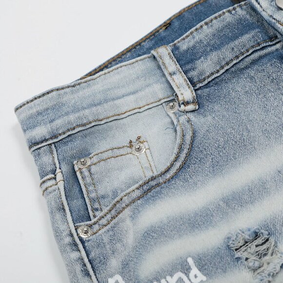 Amiri Blue Letter Full Print Patch Ripped Jeans - Picture 9 of 14